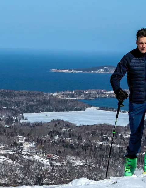 Snowshoeing through quiet snow-covered forest
