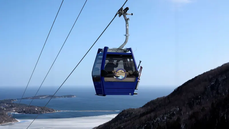Gondola cabin above the Atlantic on a clear winter day