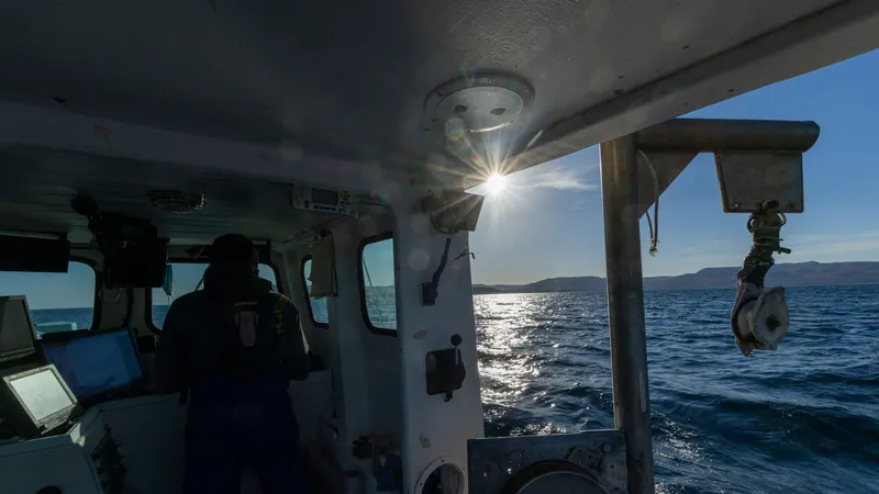 Lobster boat wheelhouse with sunlight through the window