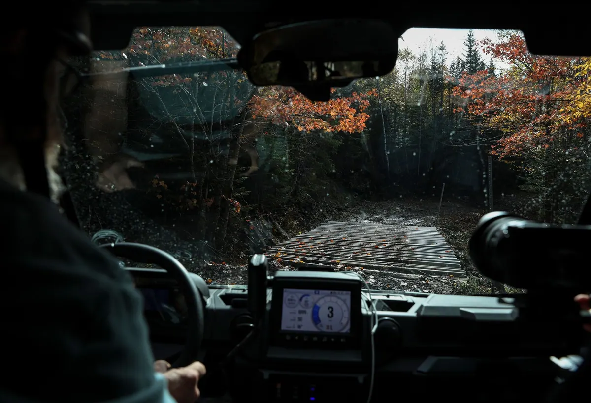 Driver’s view from an off-road vehicle on a muddy forest track