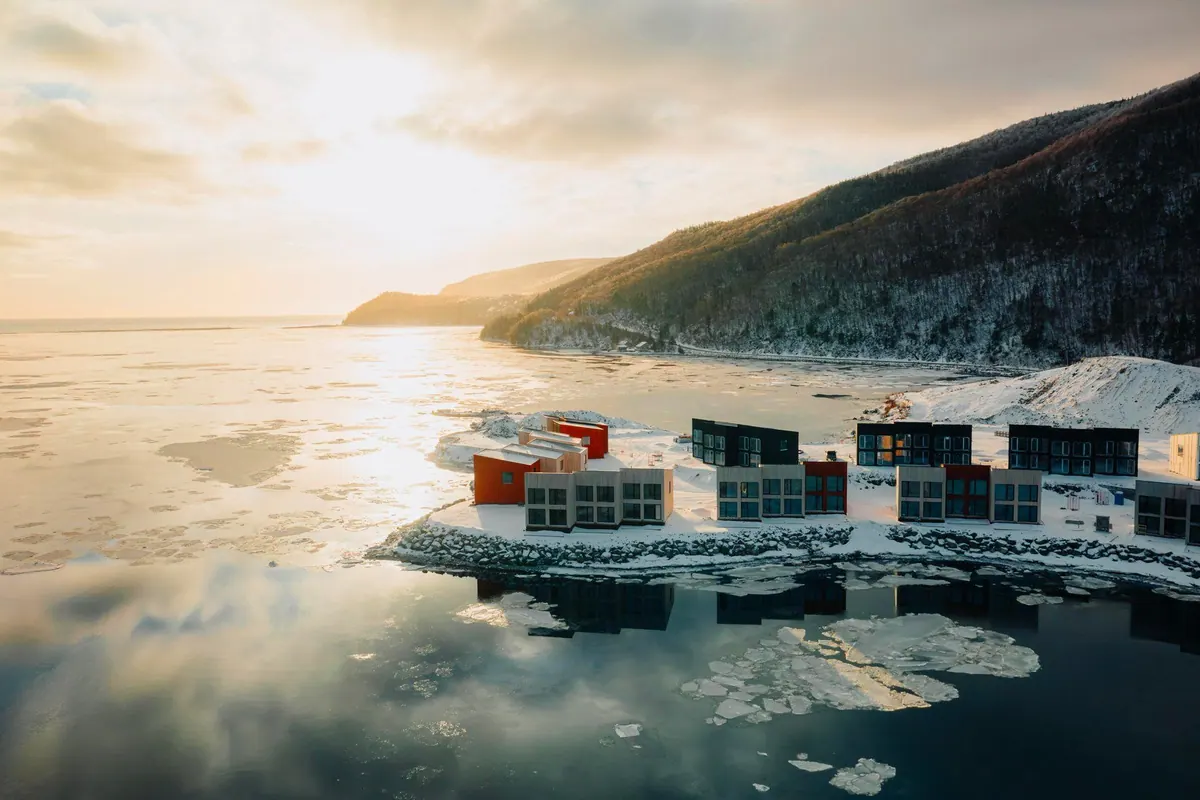 Cormorant Rock chalets completed along the waterfront in summer