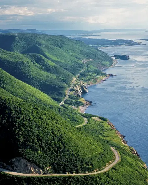 The Cabot Trail winding along green coastal hills