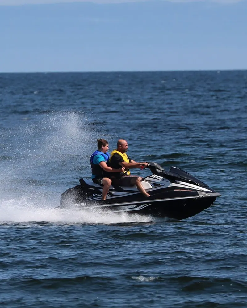 Jet ski speeding across the bay