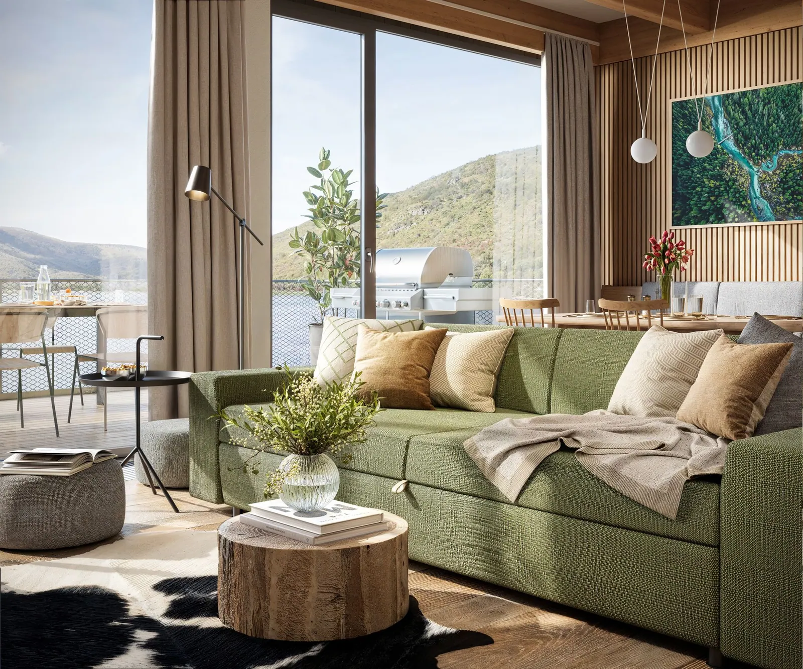 Chalet living room with a green sofa, open kitchen and timber walls